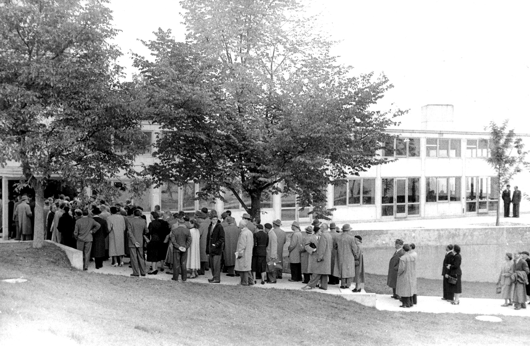 Visitors standing in line at the opening of the Ulm School of Design, 2 October 1955